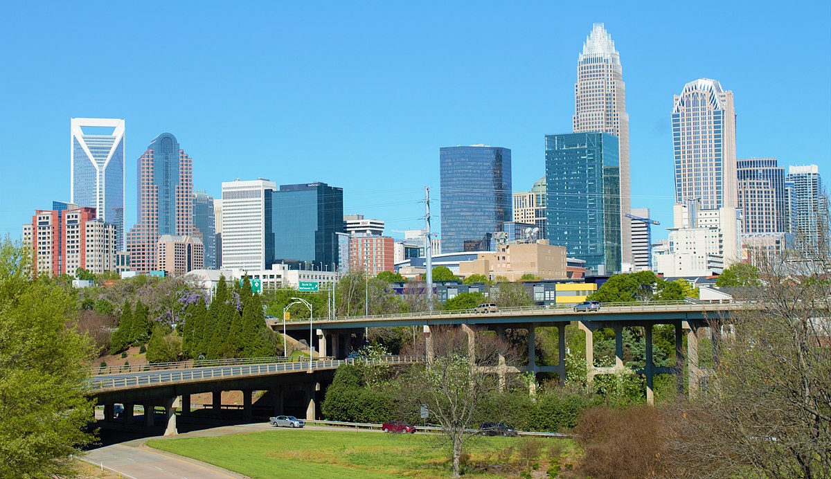 A bridge over a river in a city.