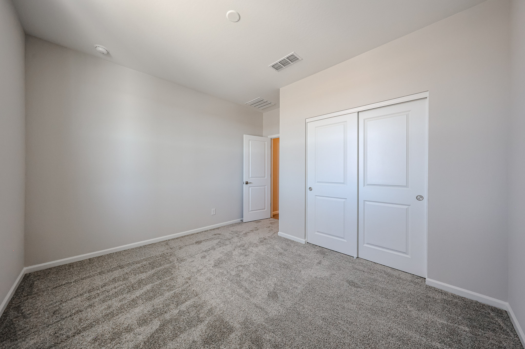 A room with white doors.