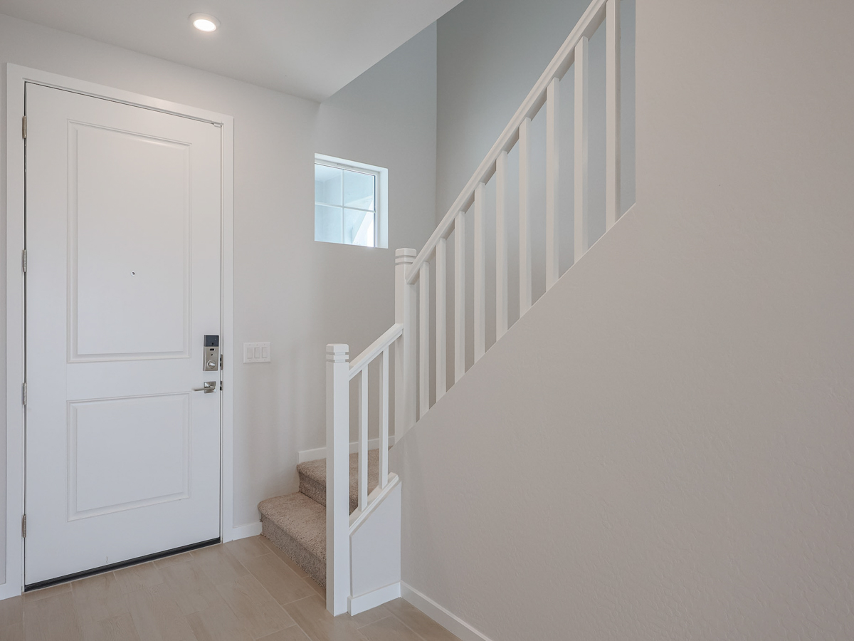 A white staircase in a house.