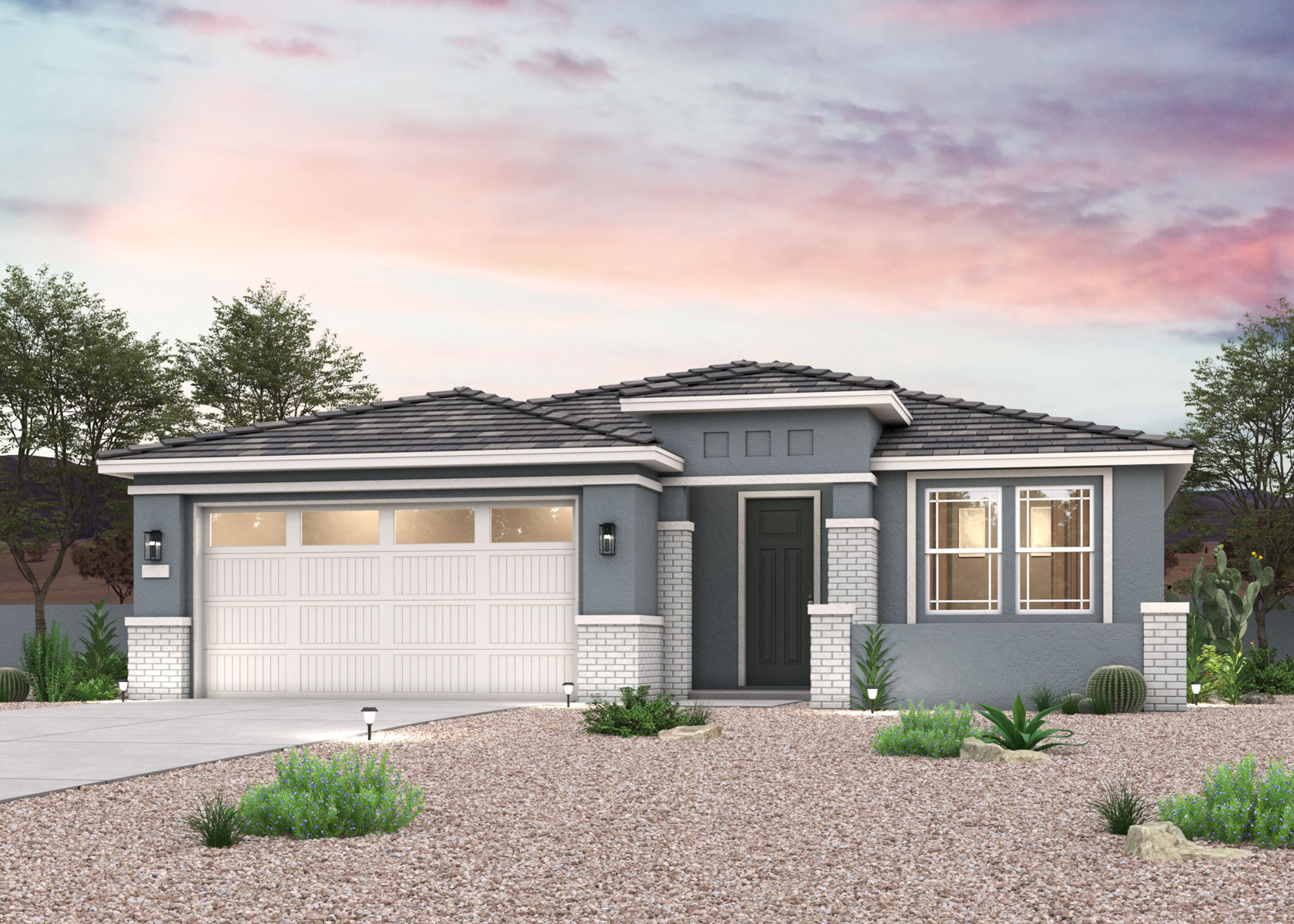 Twilight rendering of front of new ranch style home for sale in Buckeye, AZ with 2 car garage.