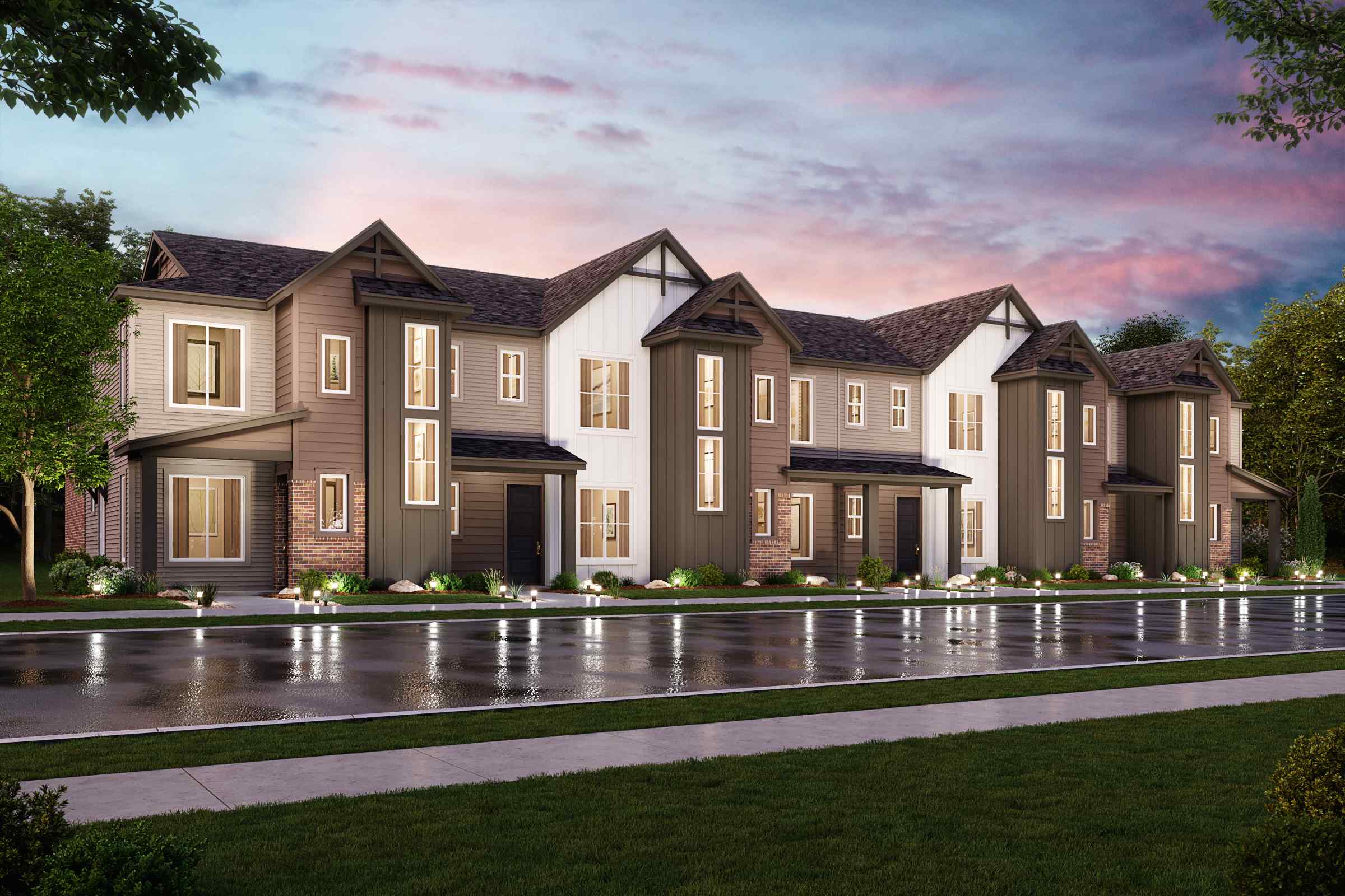 A large house with a pond in front of it.