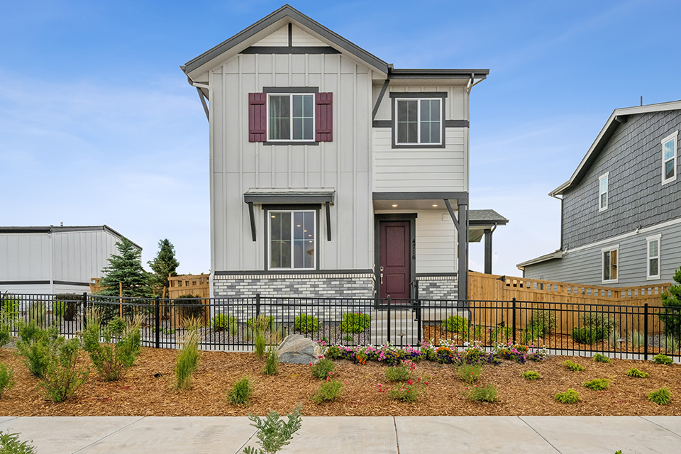 A house with a fence around it.