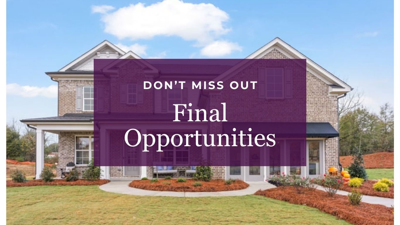 A house with a sign in front.