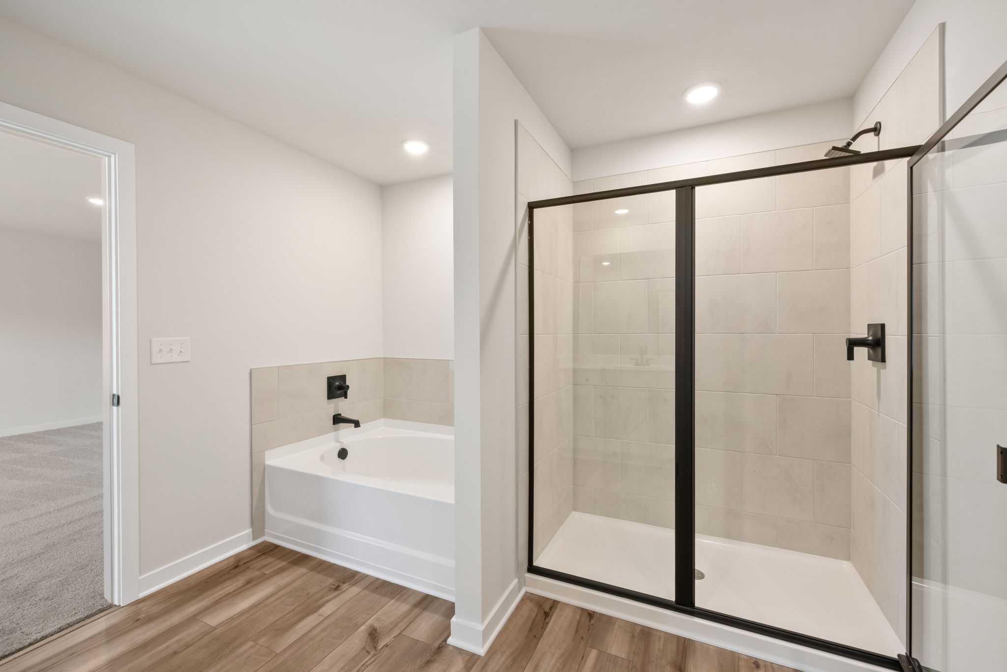 A bathroom with a glass shower.