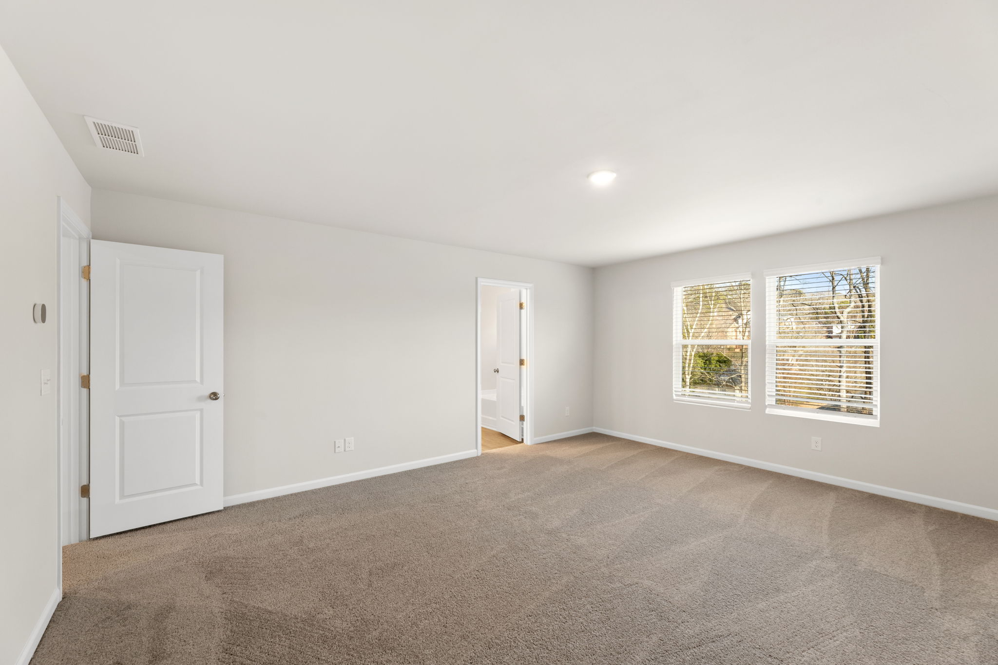 A room with white doors.