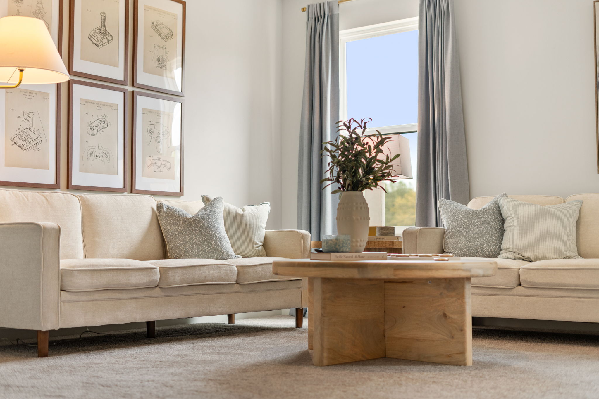 A living room with a couch and a coffee table.