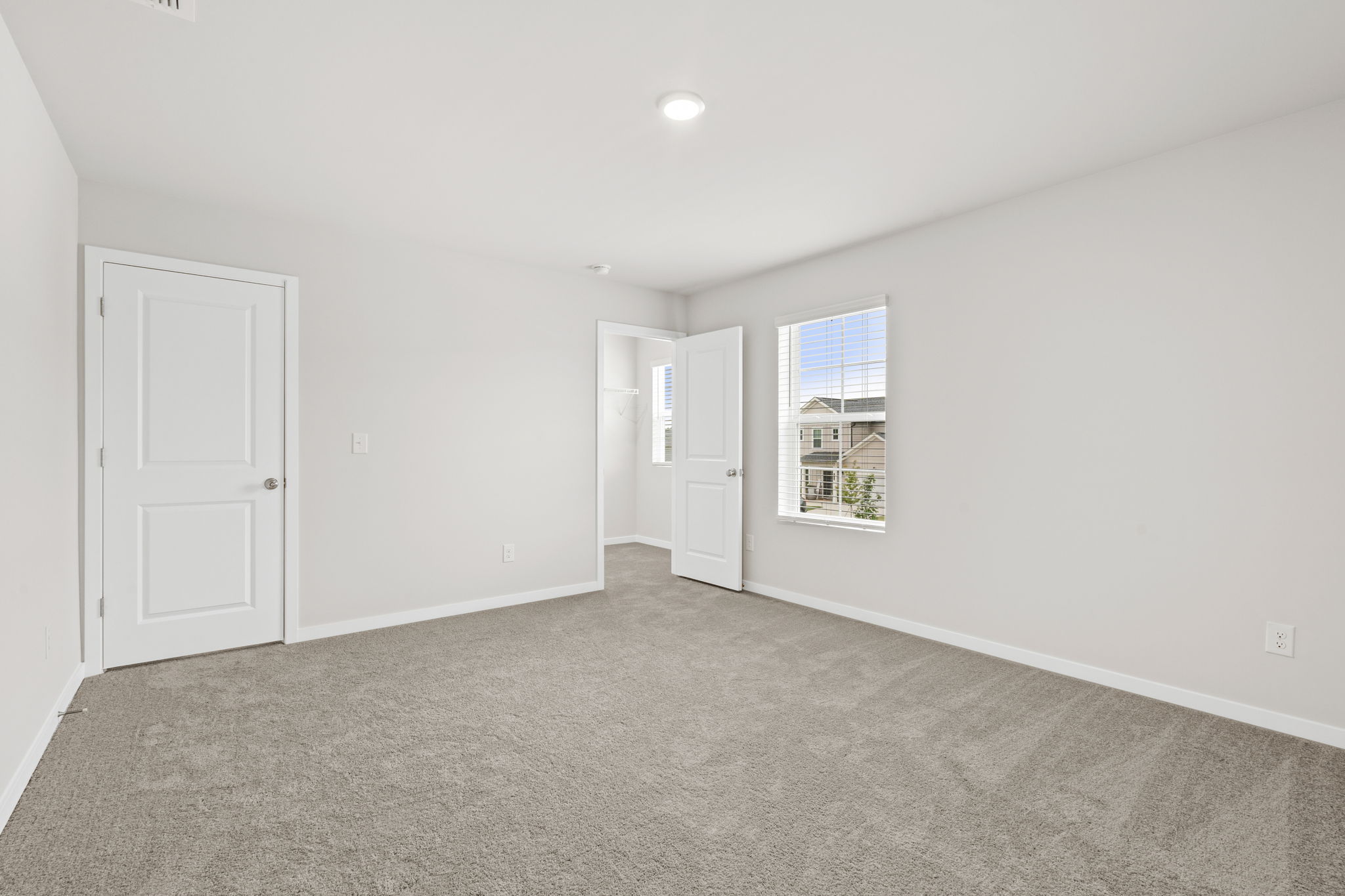 A room with white doors.