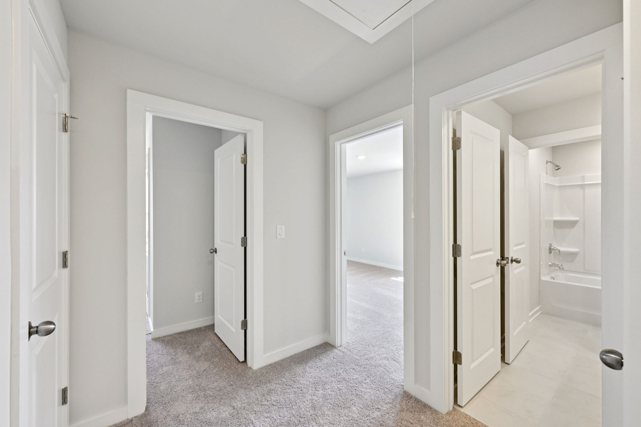 A room with white doors.