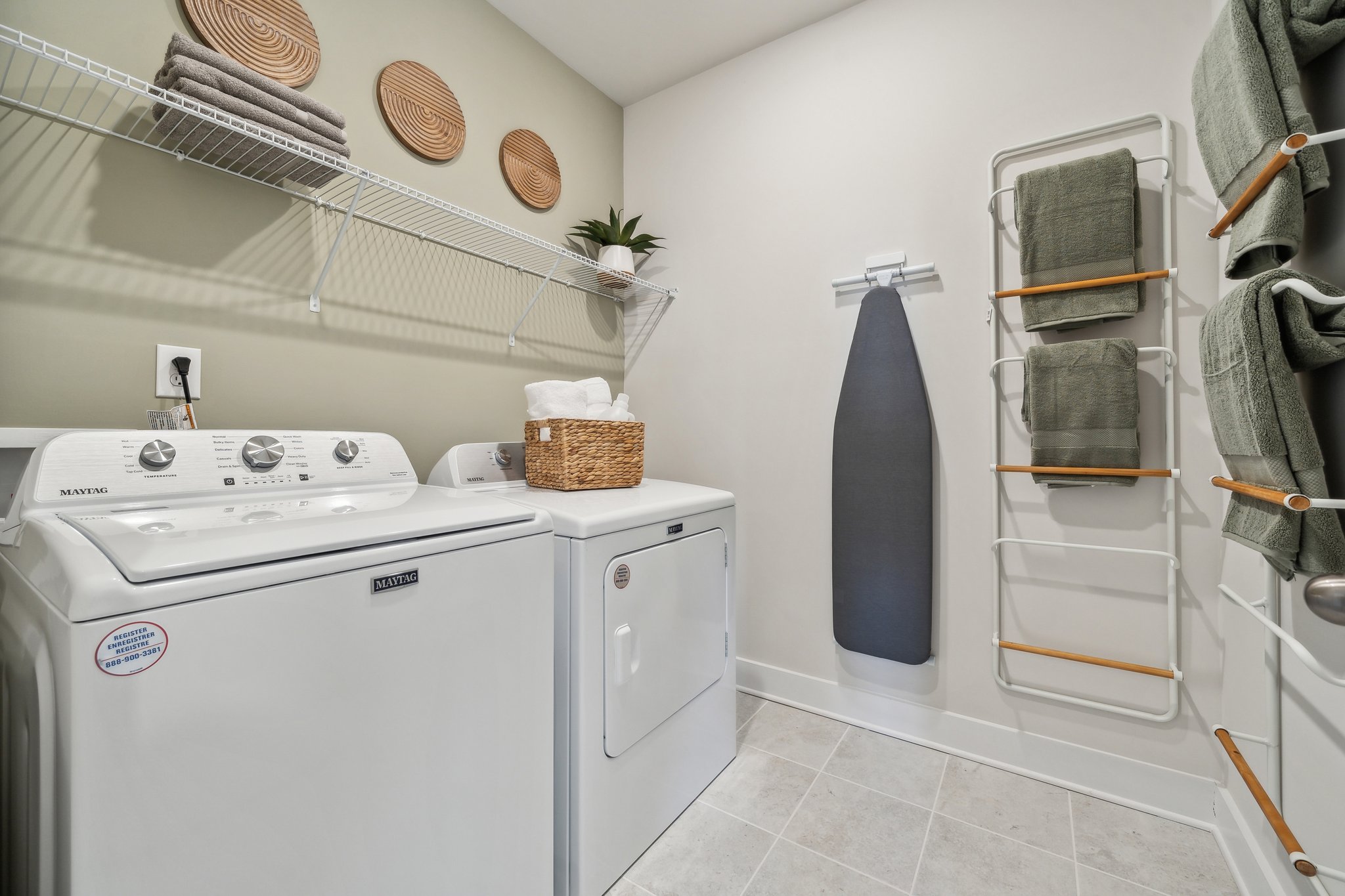 A laundry room with a washer and dryer.