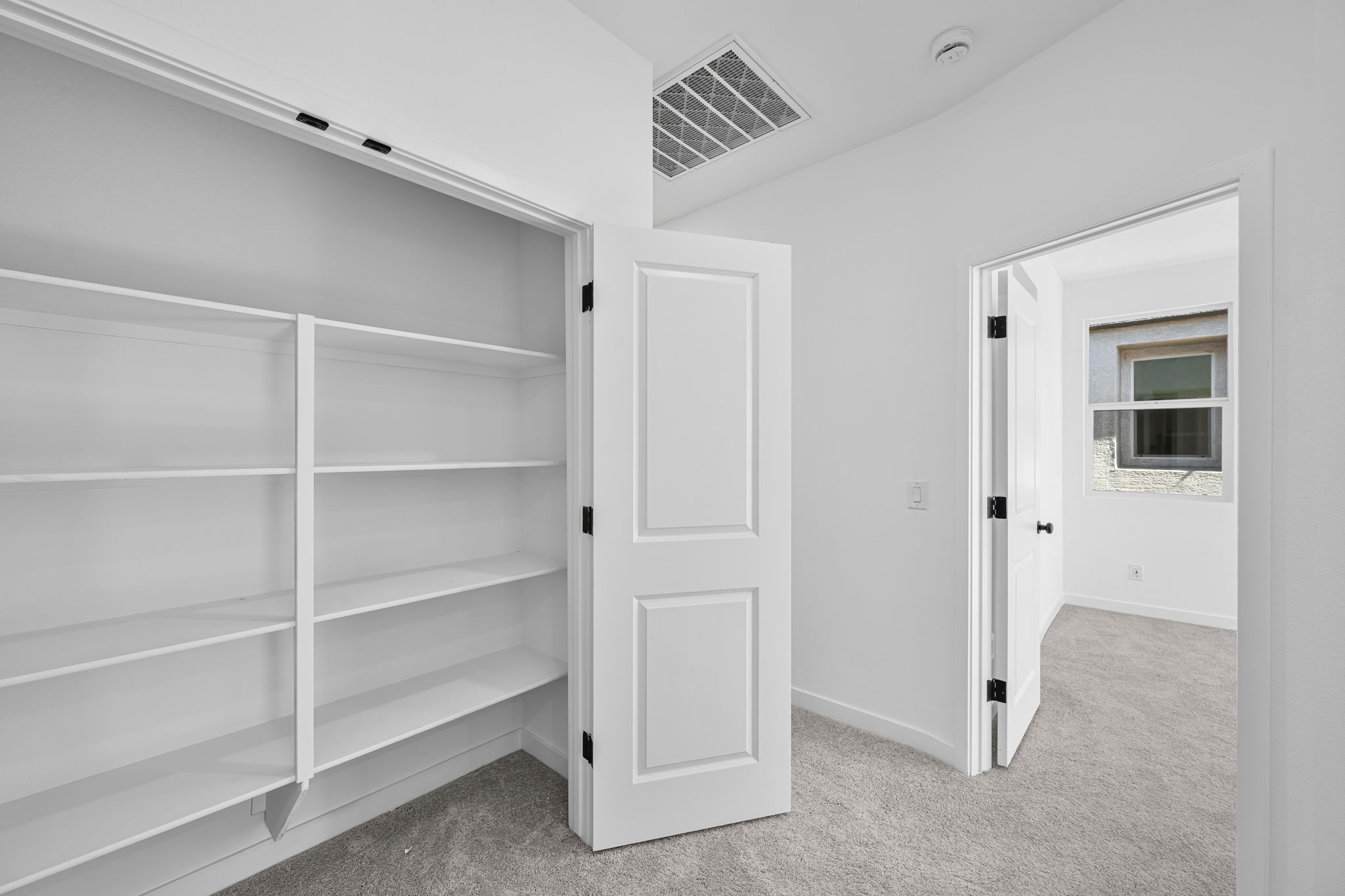 A room with white doors.