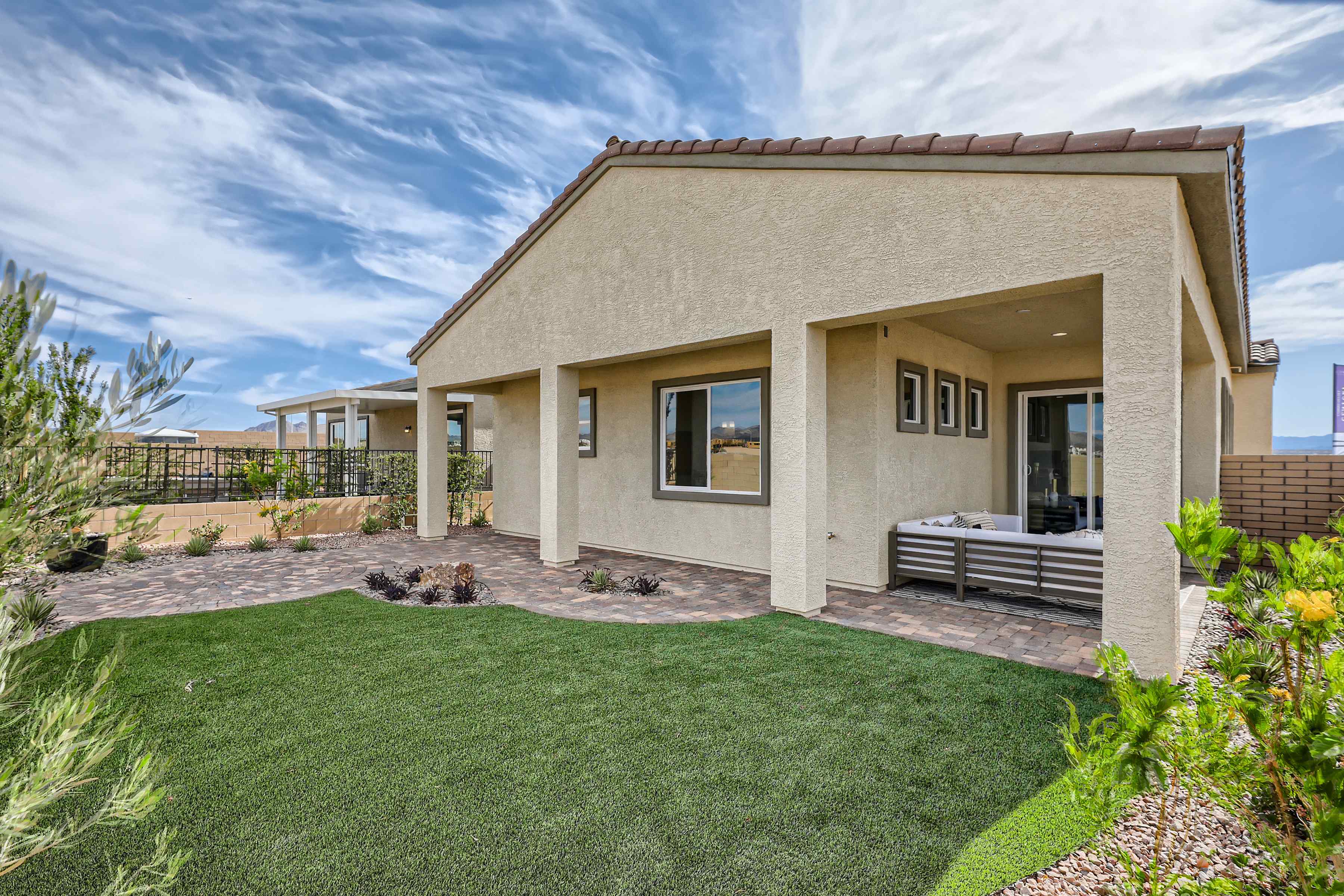 A house with a large front yard.