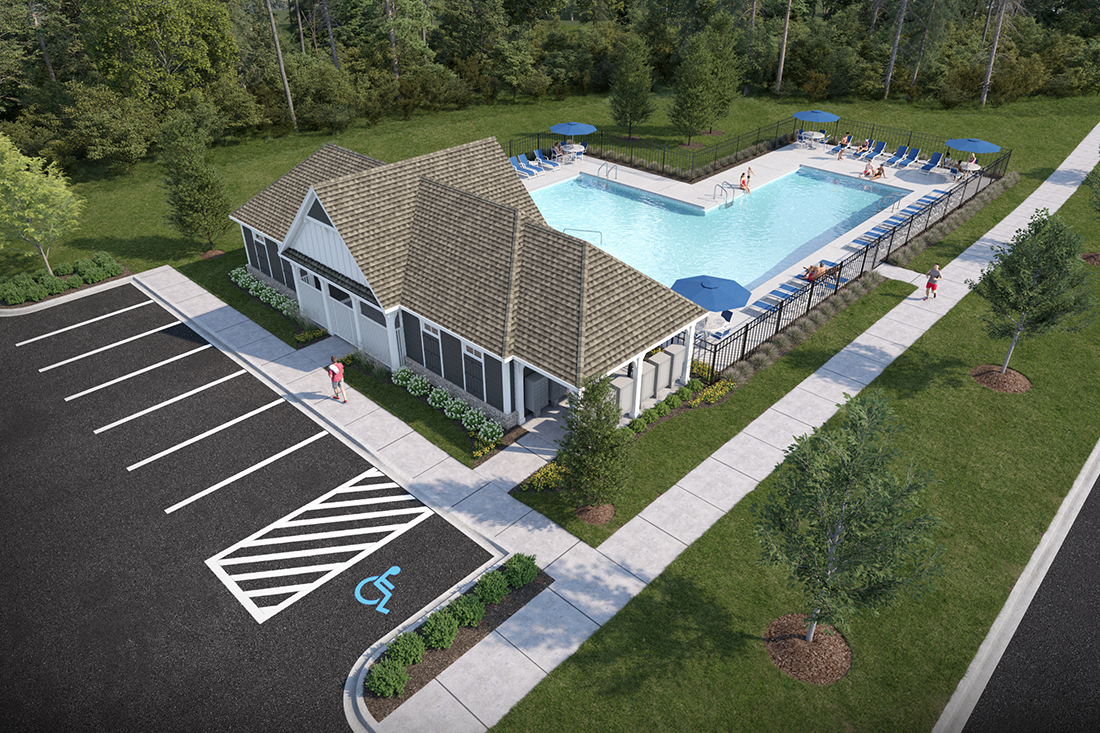 A swimming pool with a building in the background.