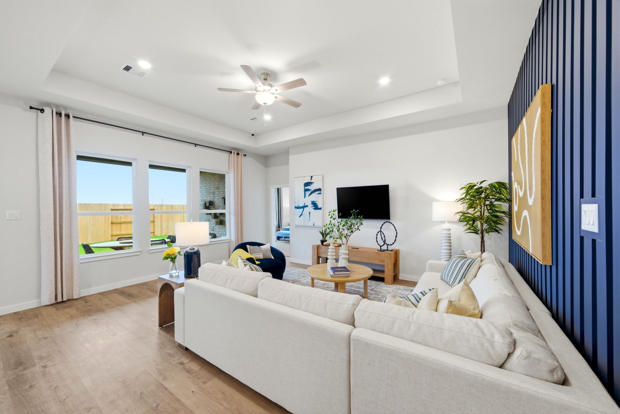 A living room with a large window.