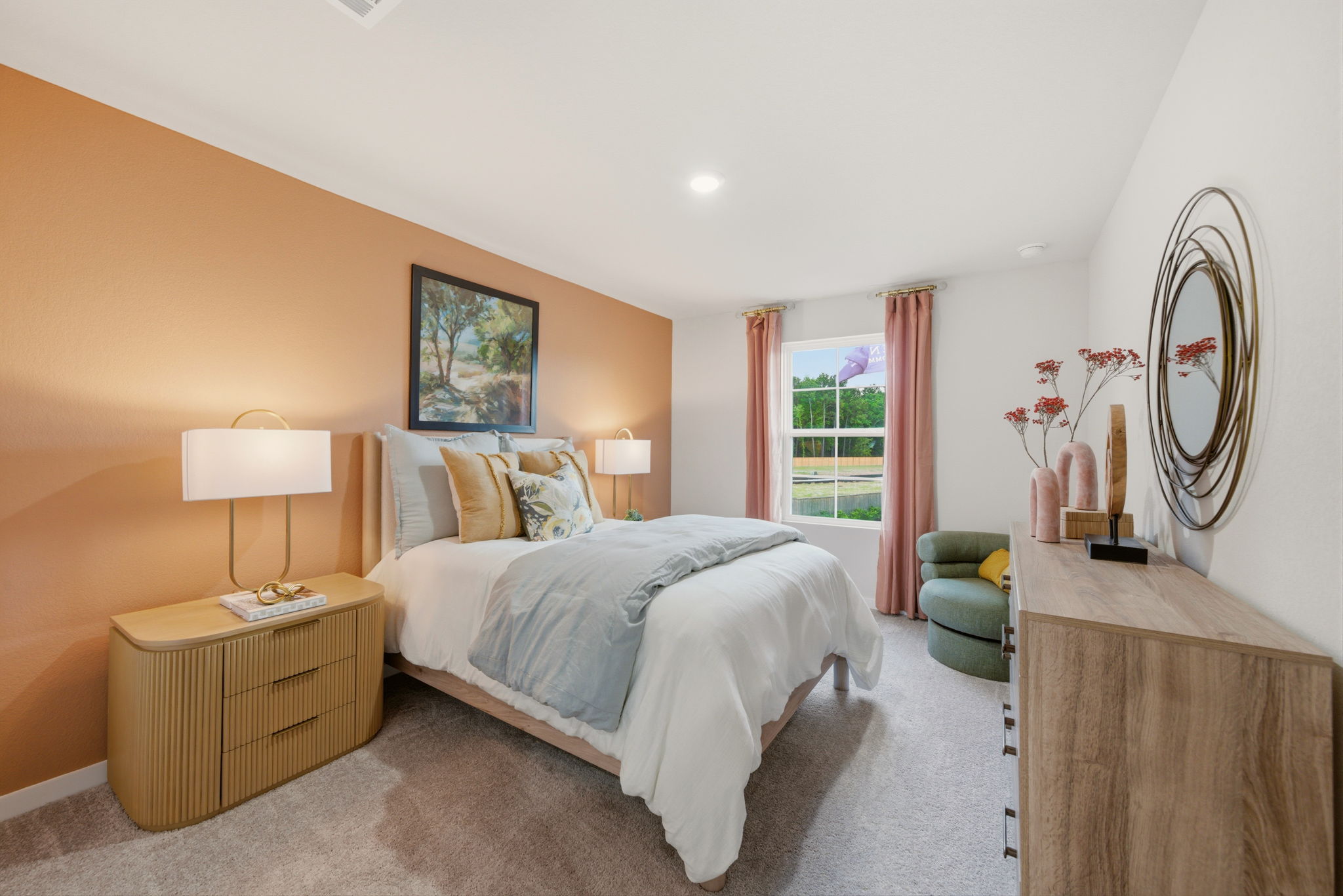 A bedroom with a large mirror.