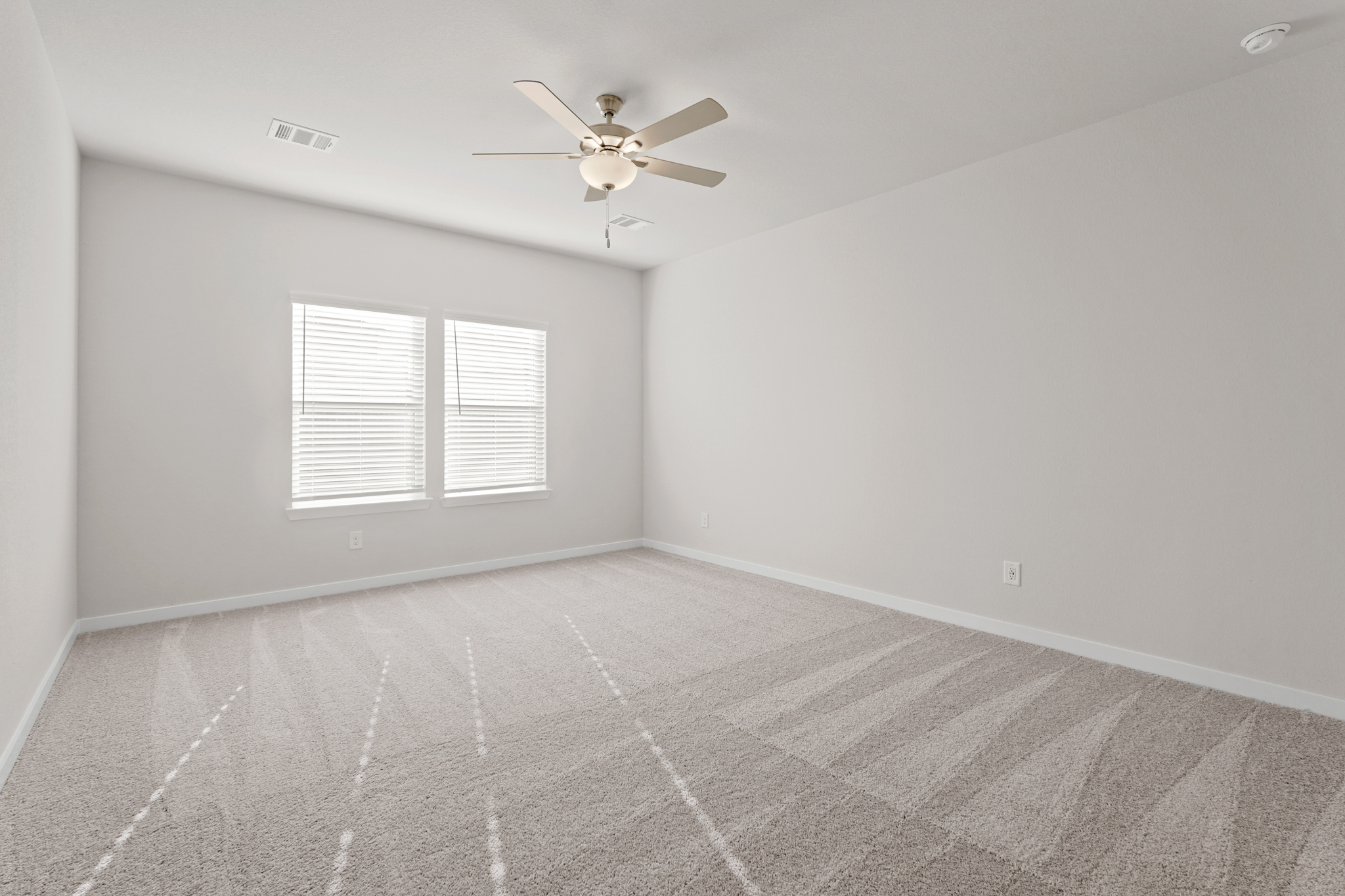 A ceiling fan in a room.