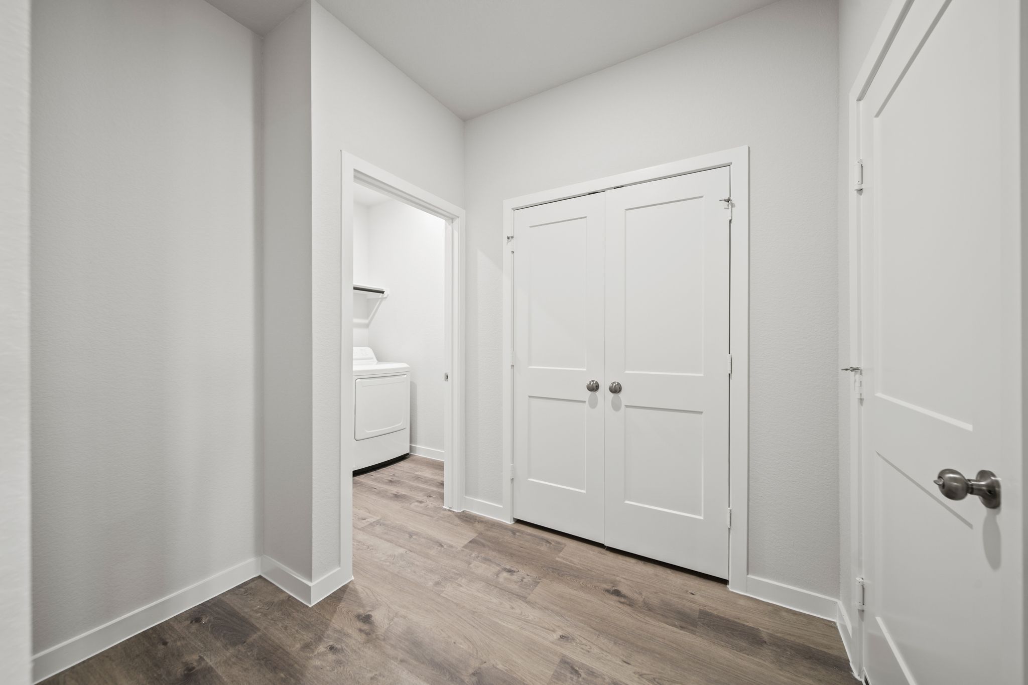 A room with white doors.