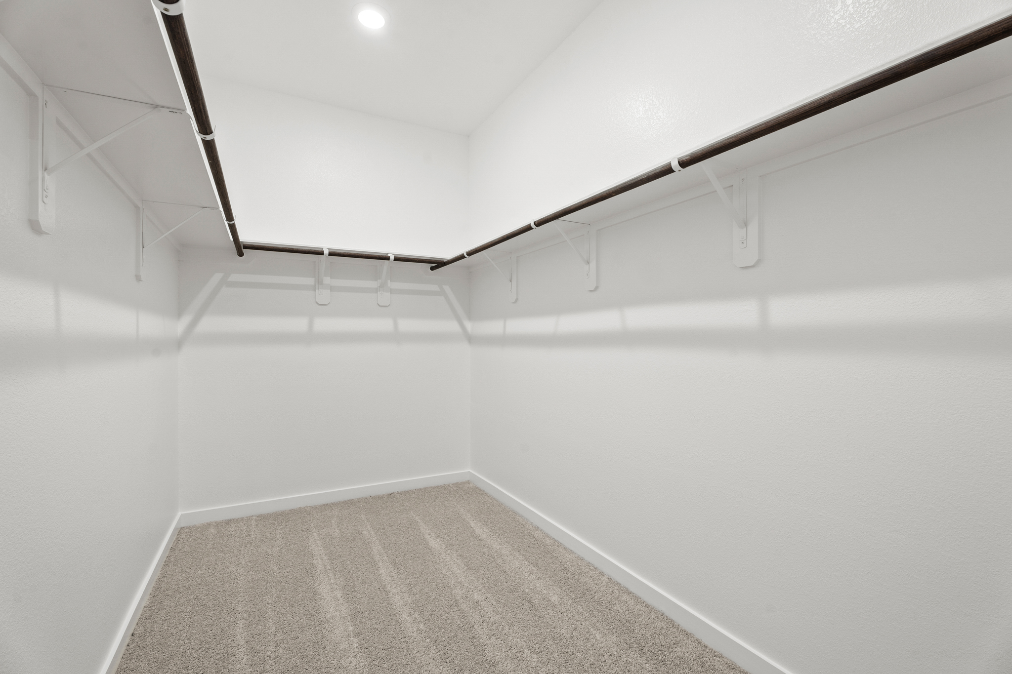 A white room with a white wall.