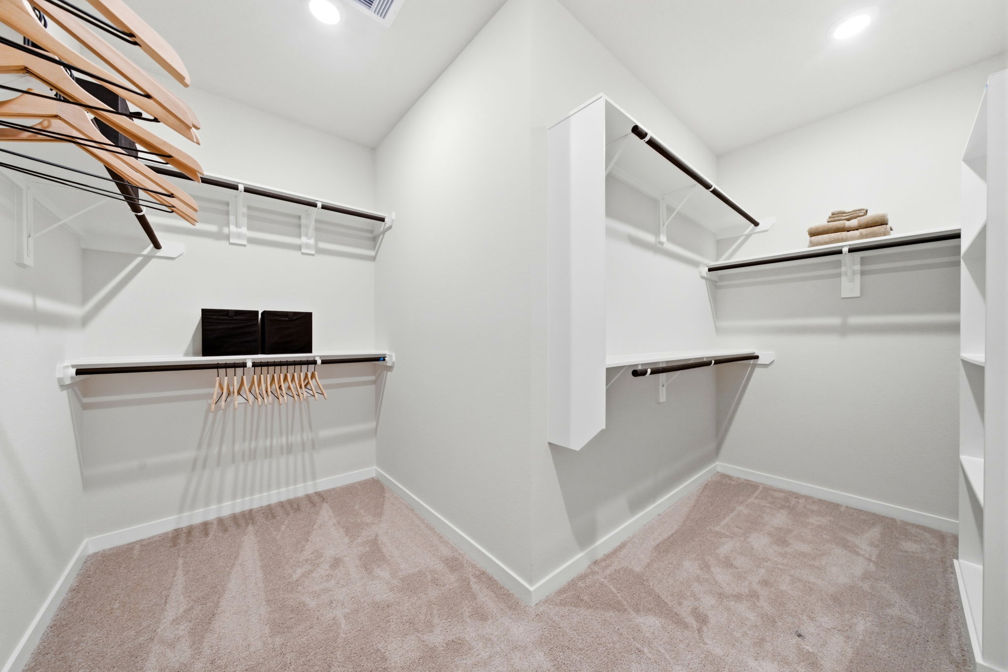 A white bathroom with a white shower.