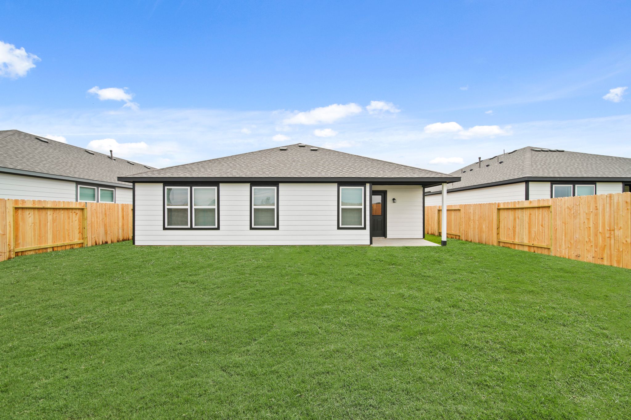 A house with a fence around it.