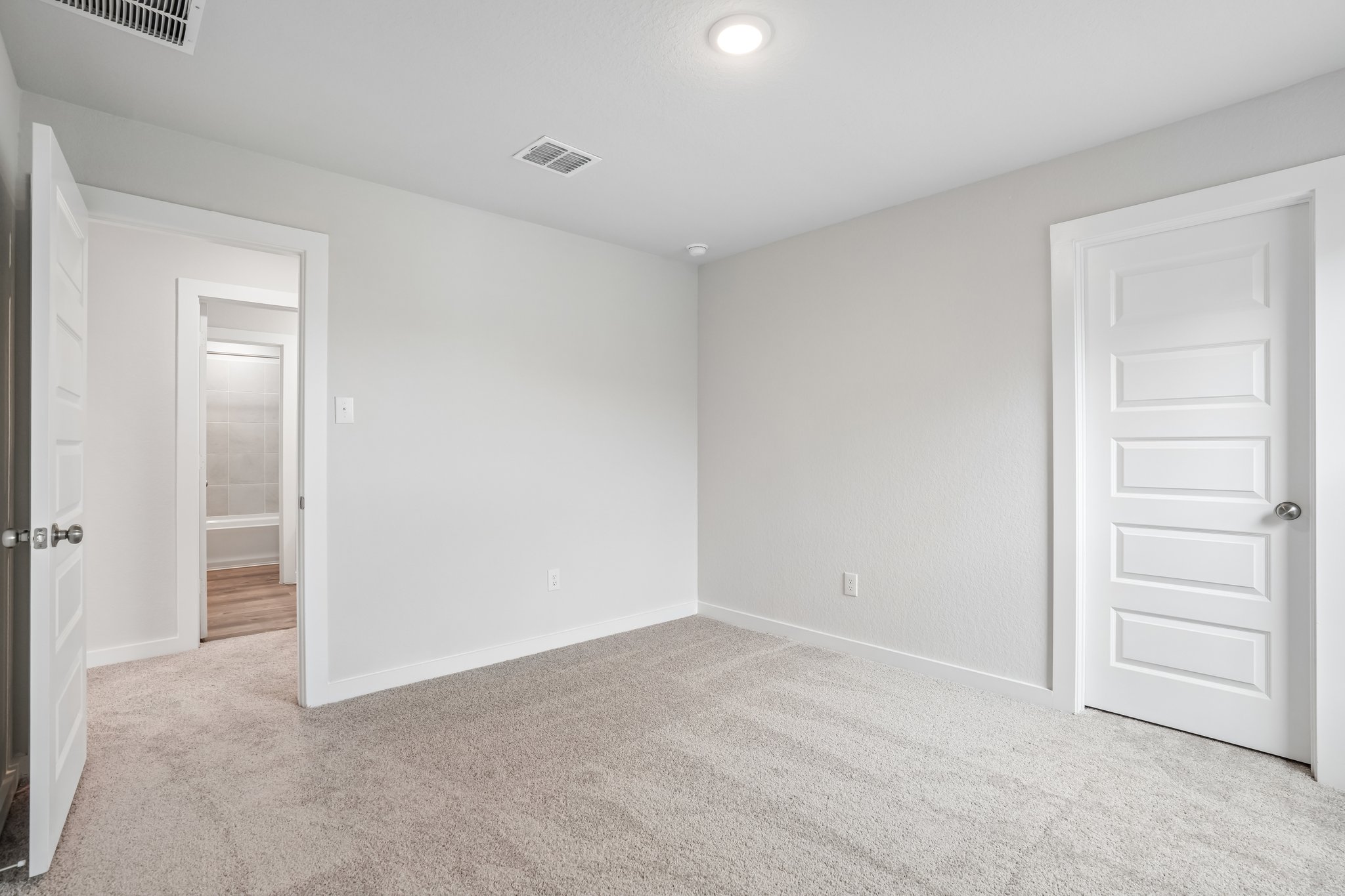 A room with white doors.