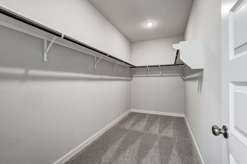 A hallway with white walls.