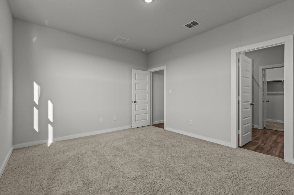 A room with white doors.