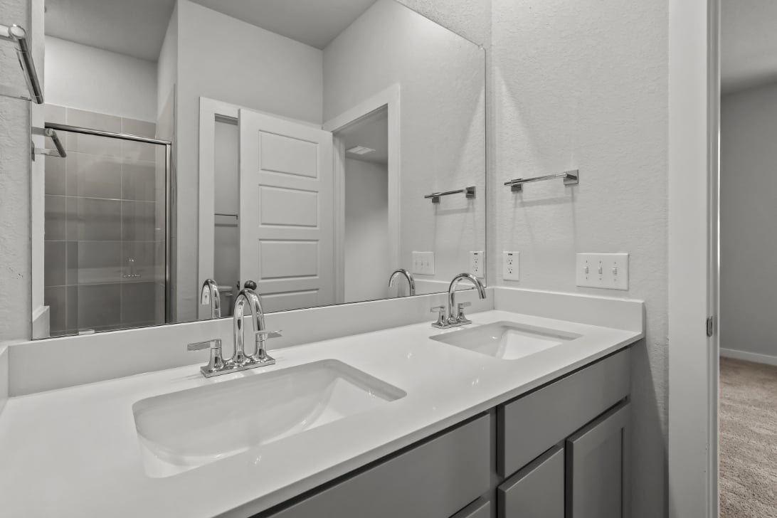 A bathroom with two sinks.