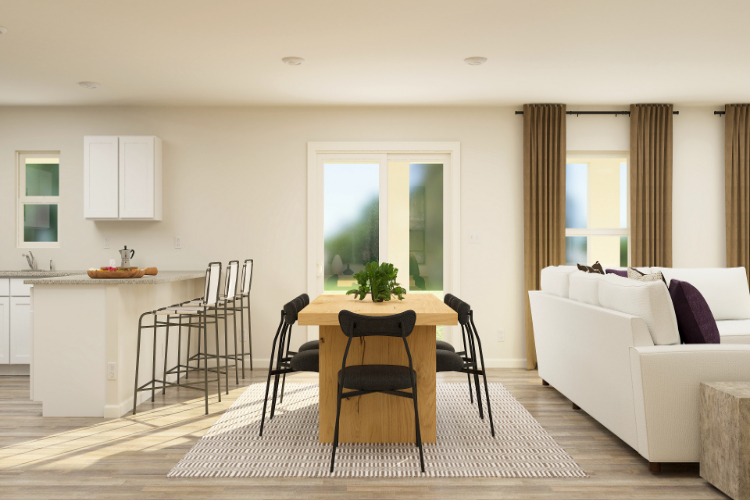 A living room with a dining table and chairs.