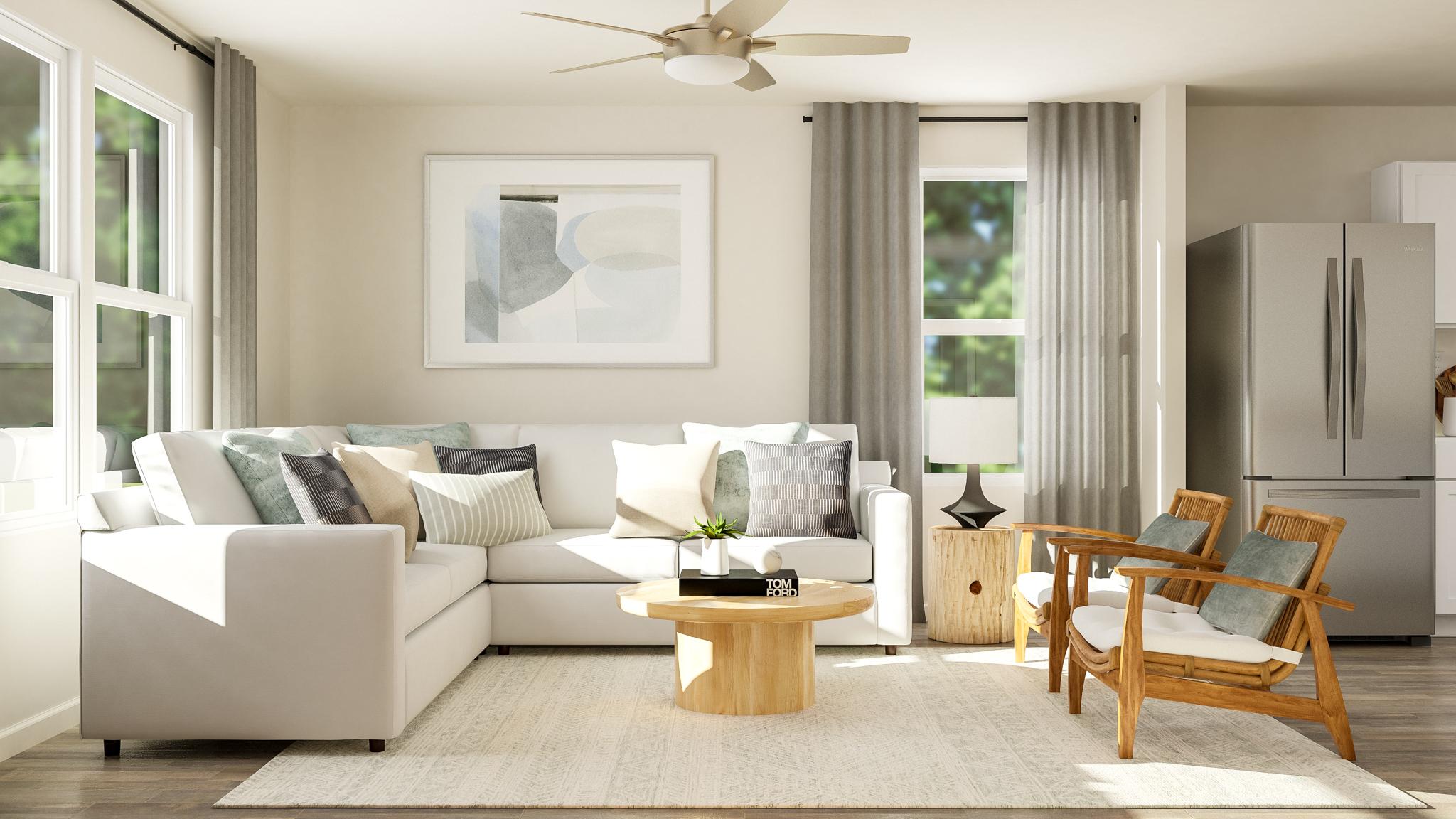 A living room with a couch and a table.
