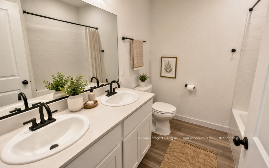 A bathroom with a sink and a toilet.